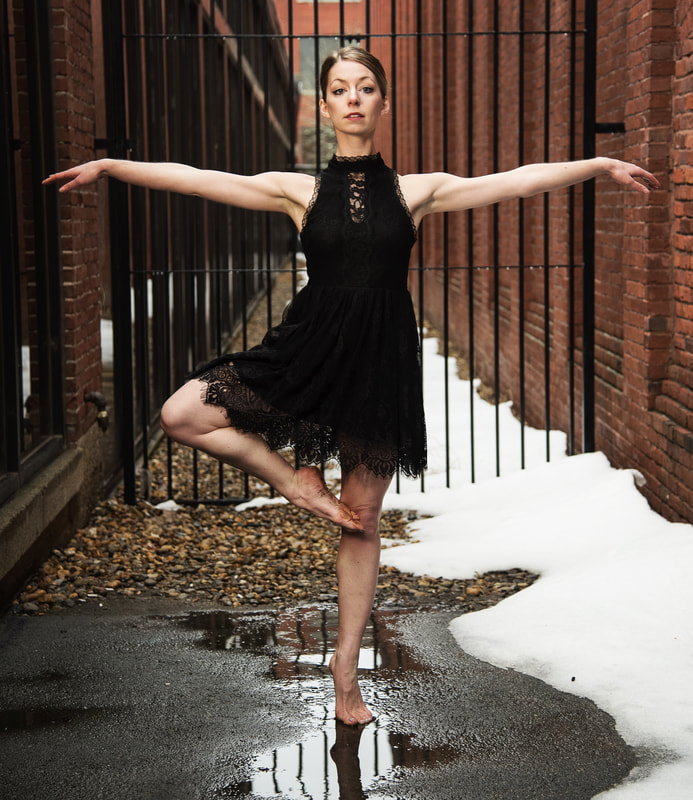 Dancer stands outside Foot points to knee, arms to side Snow melts around