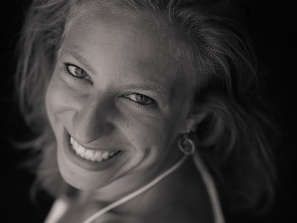 Woman smiling in black and white