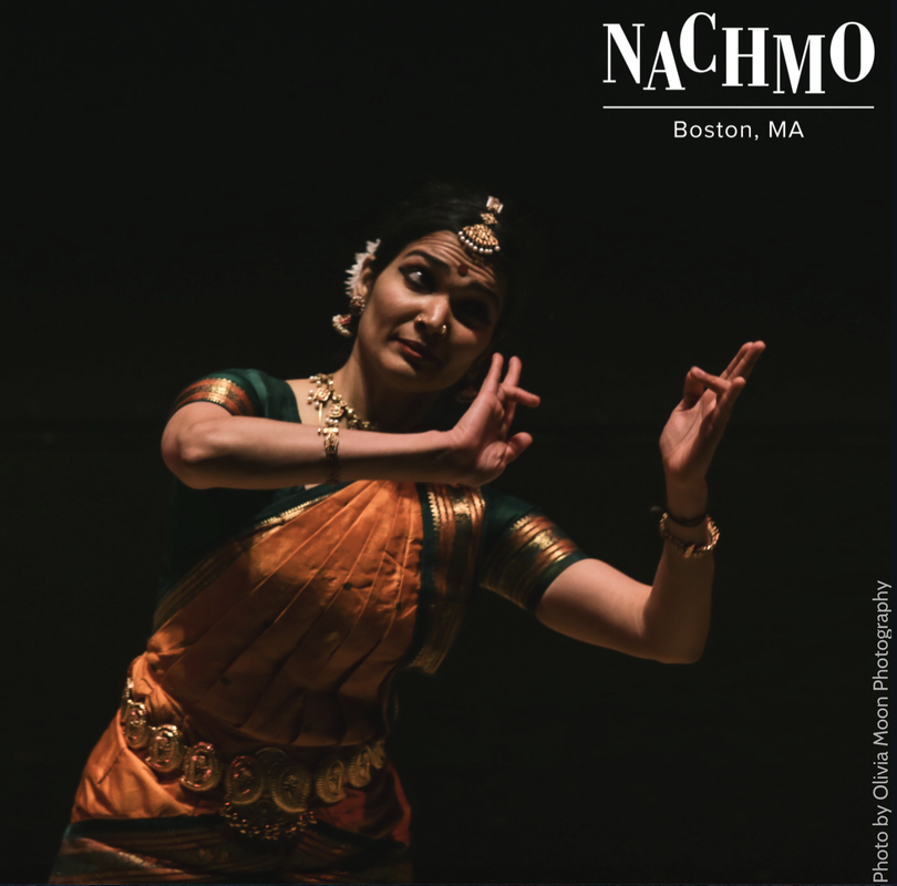 Indian Dancer, With hands to side, head tilted Performs in black room